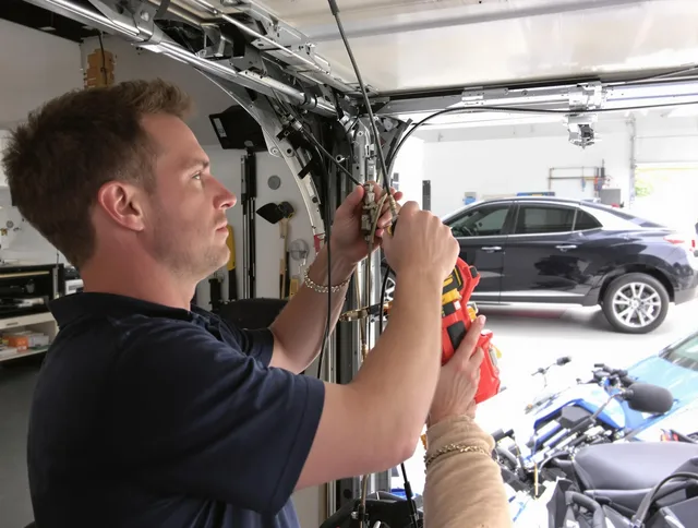 Whittier Garage Door Repair safety certified technician performing cable replacement in Whittier