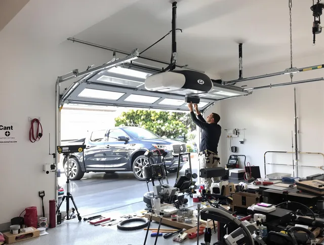 Whittier Garage Door Repair specialist installing smart garage door opener system in Whittier home