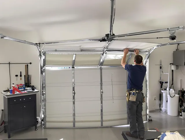 Whittier Garage Door Repair specialist performing precise section replacement on Whittier garage door