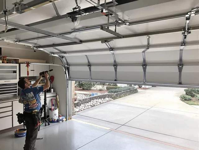 Garage door track repair service by Whittier Garage Door Repair in Whittier